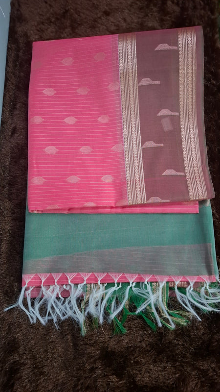 Pink cotton silk saree with metallic-tone stripes and motifs, decorative border and green tasselled pallu